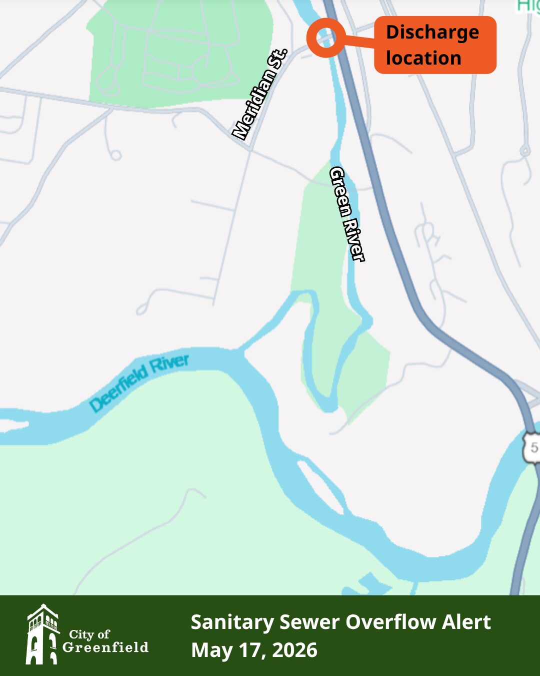 Map indicating the discharge location near Meridian St along the Green River, with the Deerfield River nearby; bottom banner reads 'Sanitary Sewer Overflow Alert' May 17, 2026 (City of Greenfield).
